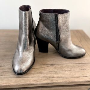 Nicole Miller. Dark silver color genuine leather upper, footbed & sole.